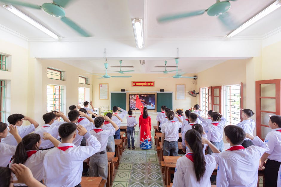A dynamic classroom scene with students engaged in a collective activity led by a teacher.